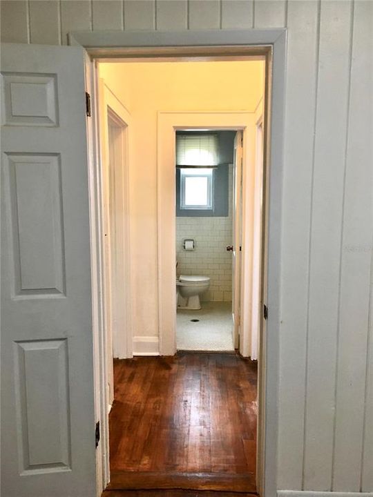 2nd entryway from office/den/bedroom #4 into hall & leading to half bath