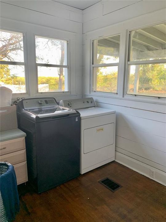 Laundry room view of backyard
