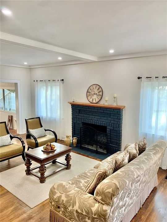 Living room w/wood burning fireplace