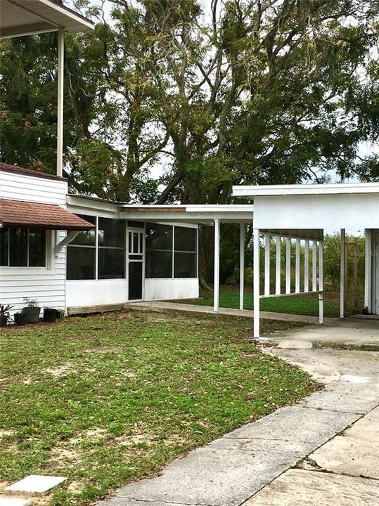 Covered walkway connecting carport to home