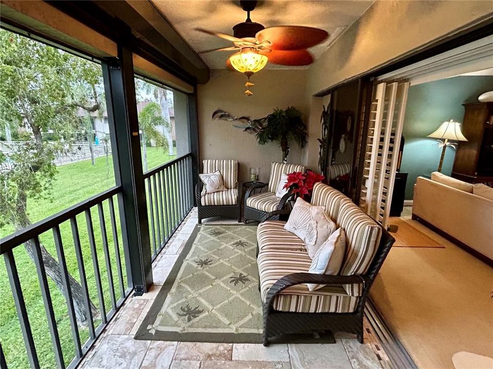 This is a great space overlooking the tennis courts, garden, and pool area.