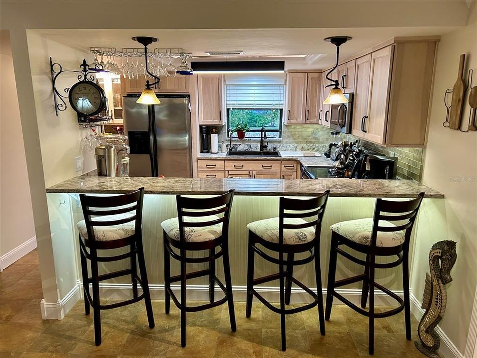 Complete with a granite breakfast bar, it's great for guests.