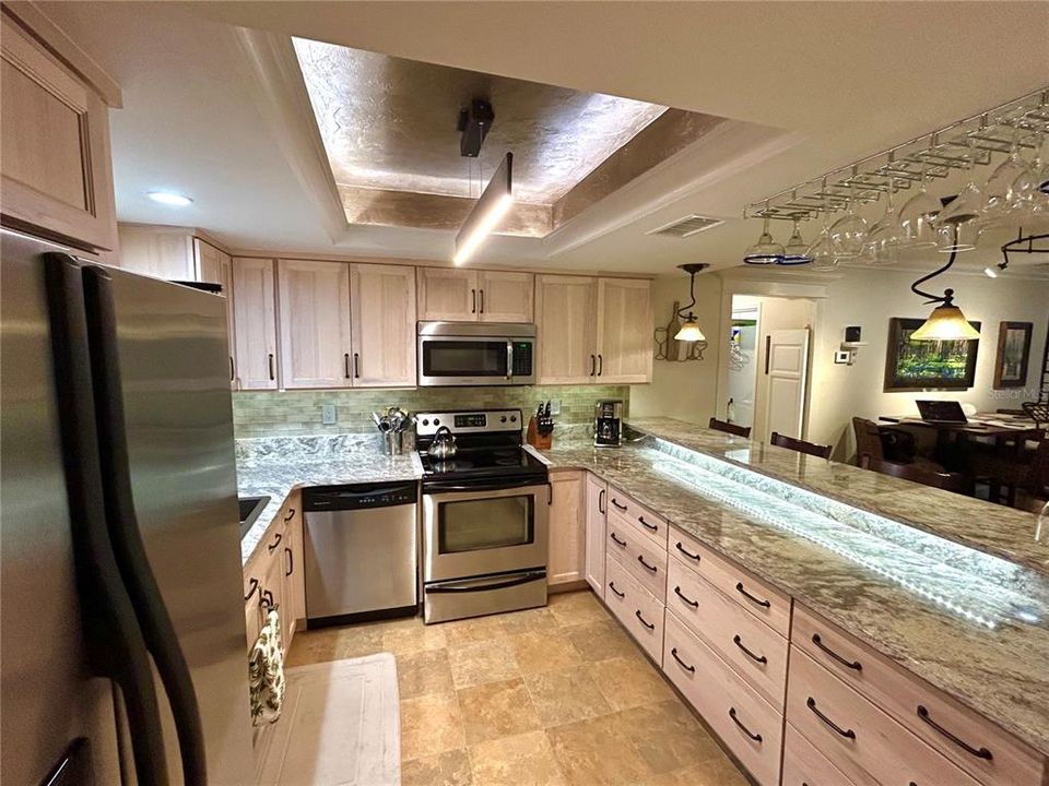 The kitchen is spacious and well-designed.