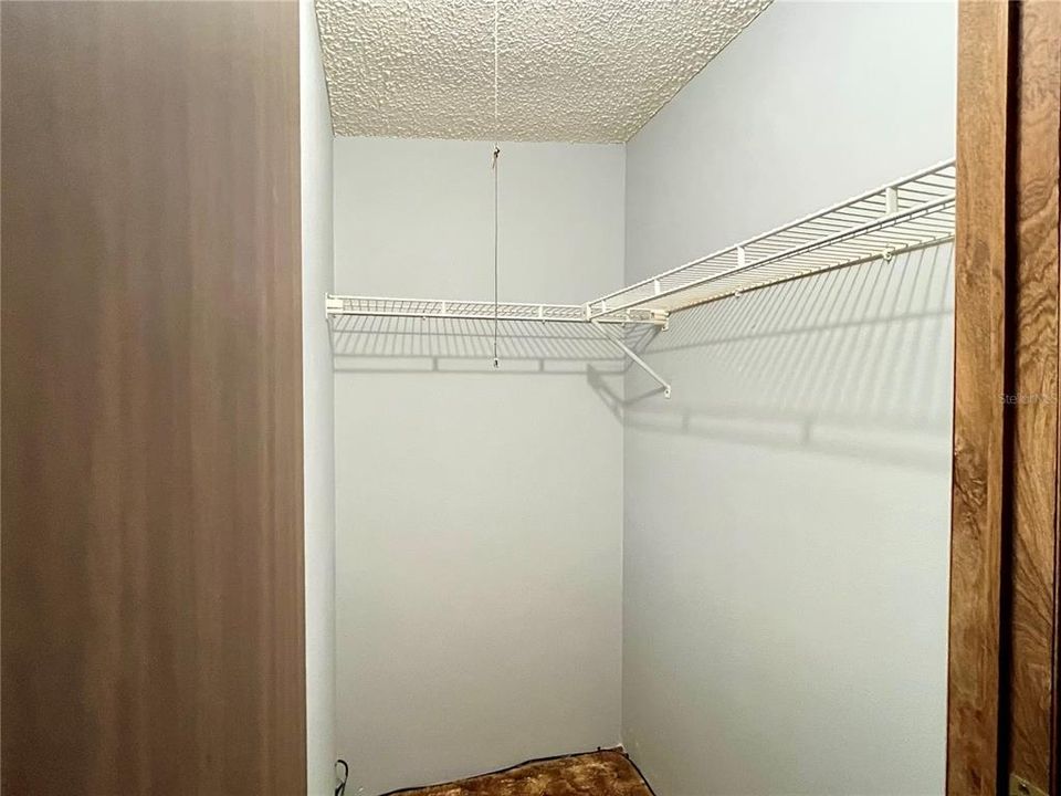 2nd Bedroom Walk-in closet with shelving