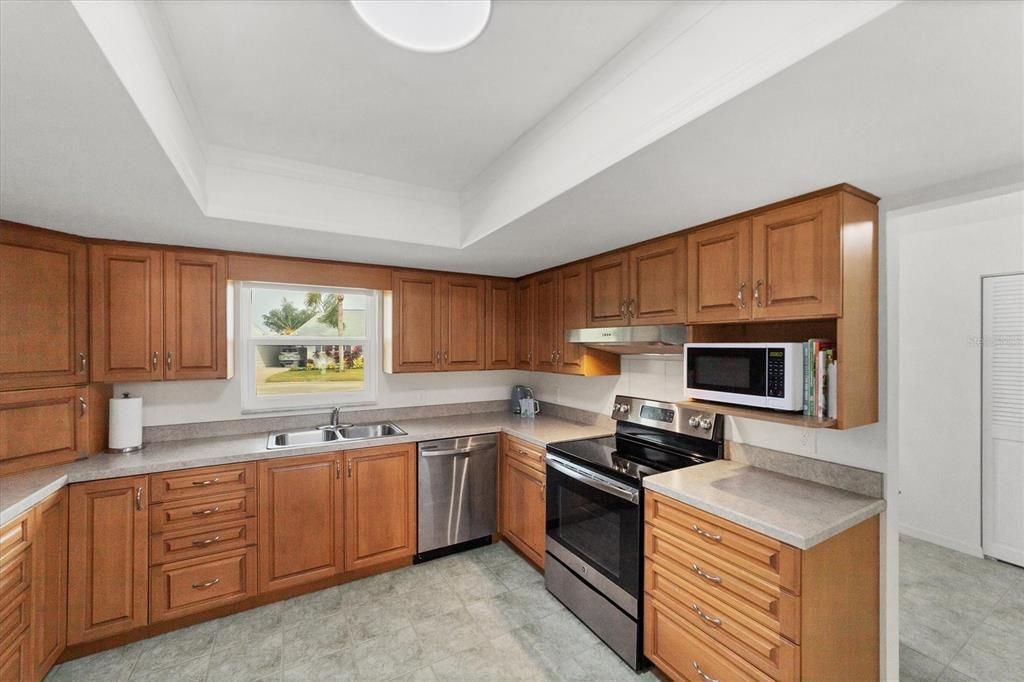 Great storage in all wood cabinets!