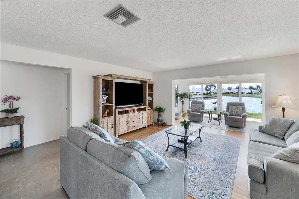 Open living room with serene lake views!