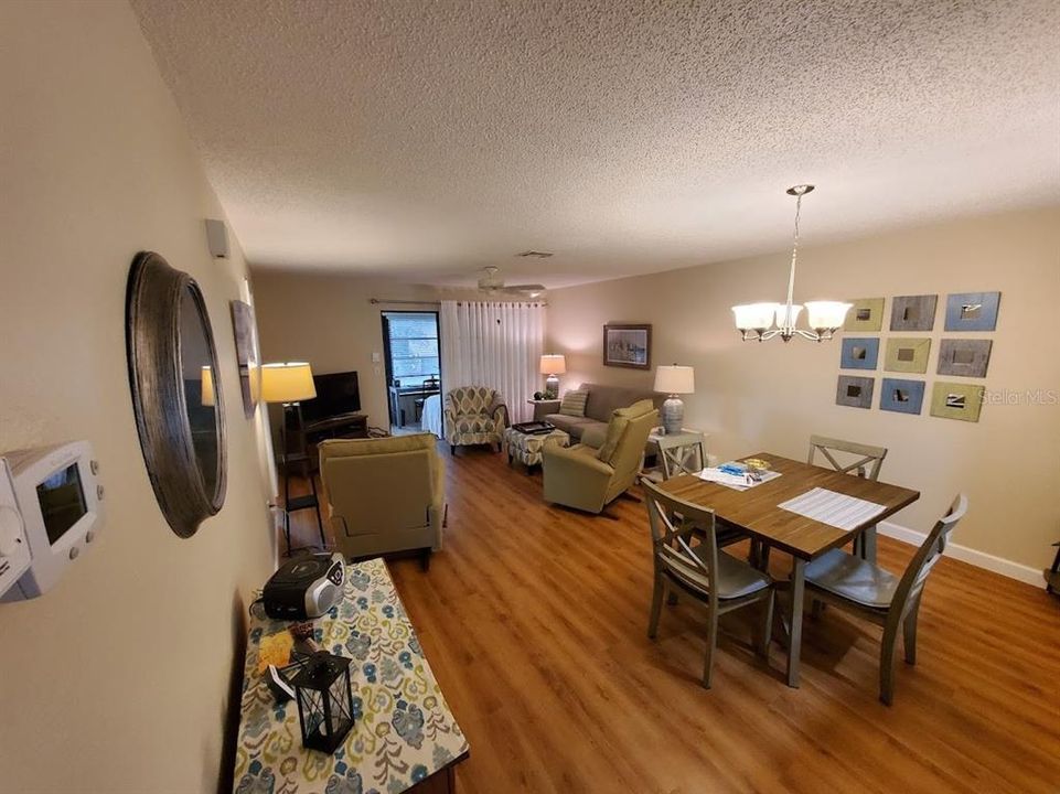 LIVINGROOM LOOKING IN FROM FRONT DOOR