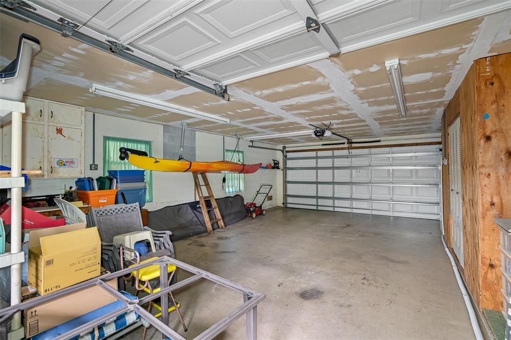 Oversized garage with hurricane impact door.