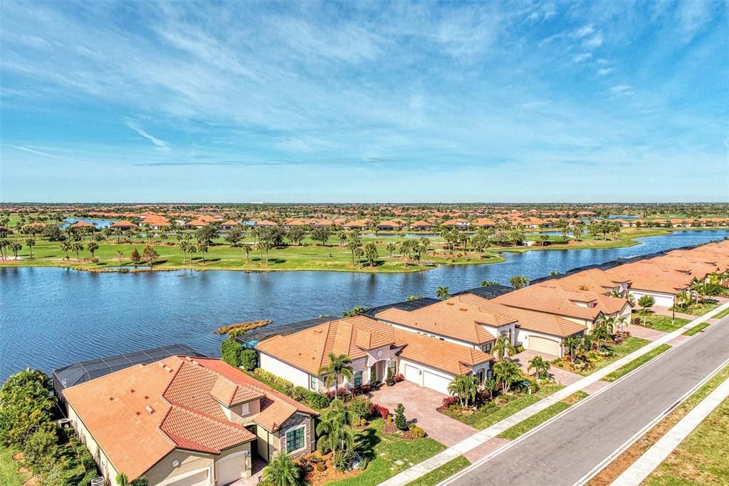 The home enjoys the waterways, the green spaces and golf course.  A perfect trifecta.