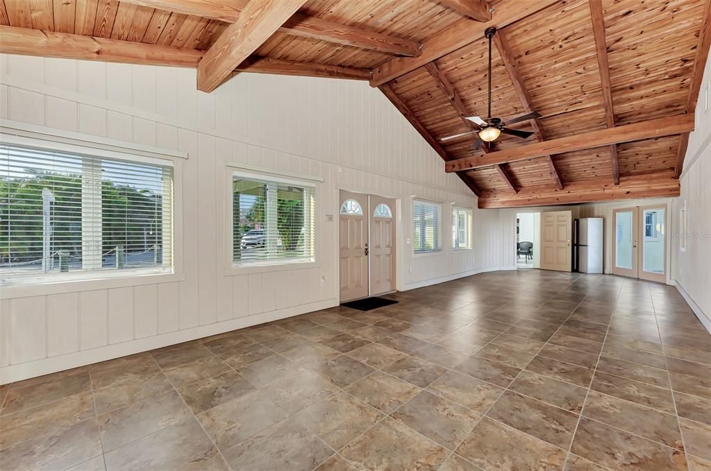 ONCE ENTERING THE FRONT DOOR, THIS ENTRYWAY/PATIO/ ALLOWS YOU TO ENTER TWO HOMES.