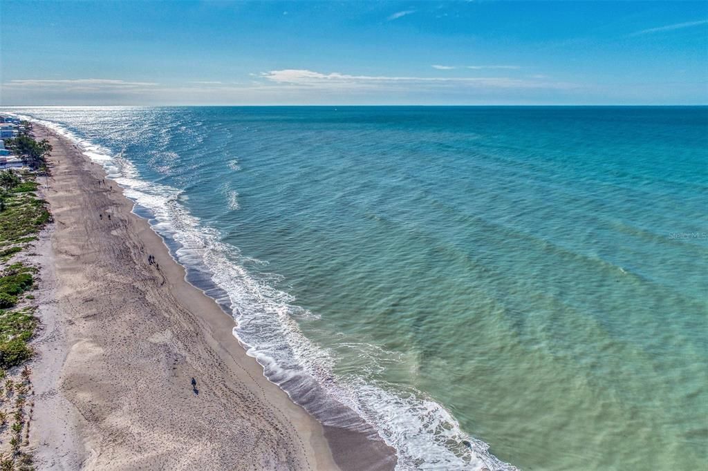 PEACEFUL WAVES ALONG THE BEACH.