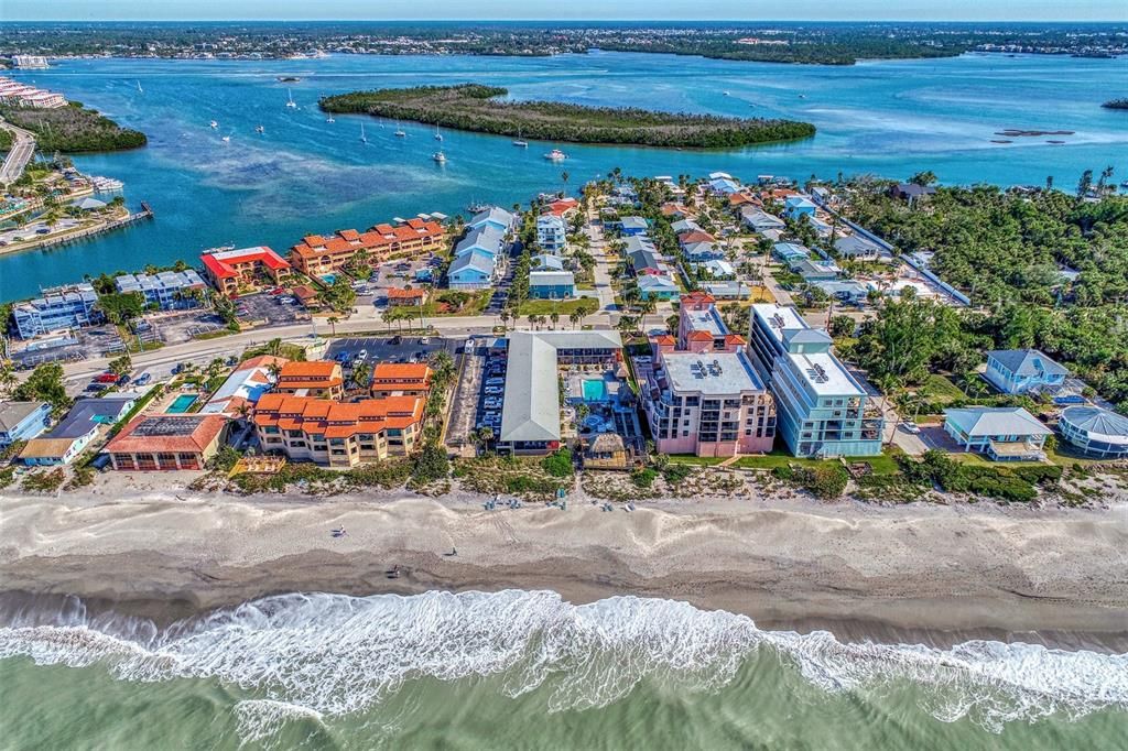 THIS PHOTO WAS TAKEN FROM THE GULF OF MEXICO TOWARDS THE EAST OVERLOOKING MANASOTA KEY.  NOTE THE WAVES PUSHING UP TOWARDS THE BEACH.