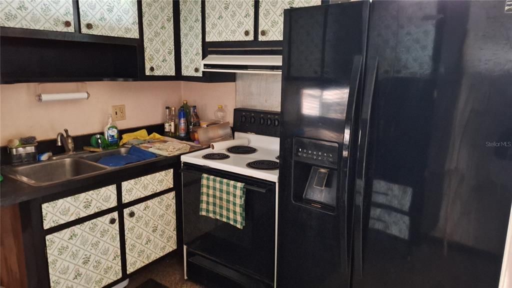 Nice side by side Refrigerator and Stove.