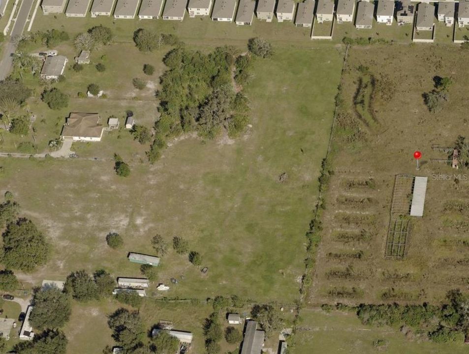 Aerial view of the 3 Lots adjoining the 5.22 acre 'Red Pin' lot to the East