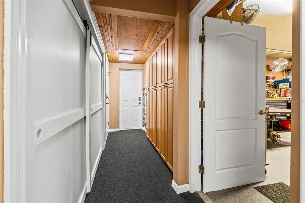 Garage storage and hallway to extra suite