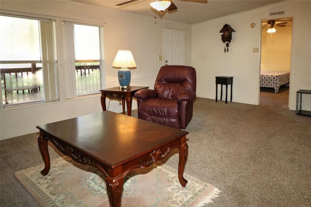 featuring spacious living area...