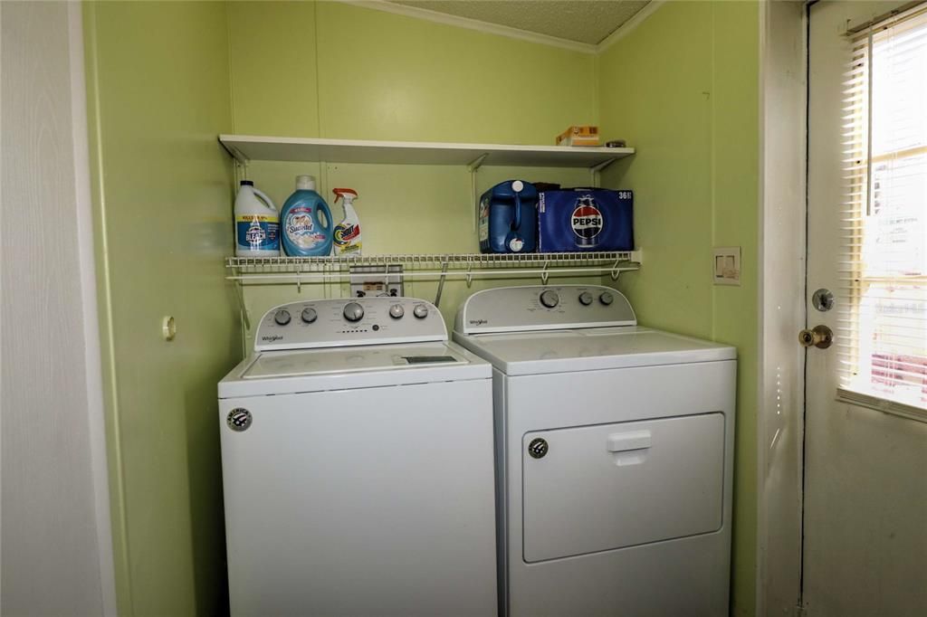 Inside utility with washer & dryer....