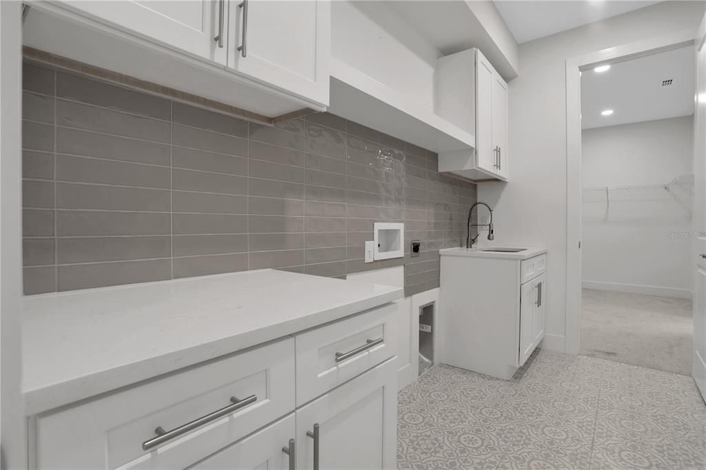 Large Laundry Room connected to Primary Closet