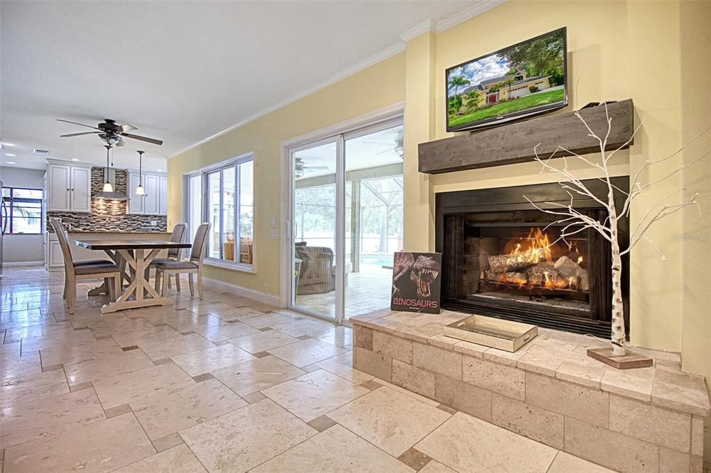 Family room with wood burning fireplace