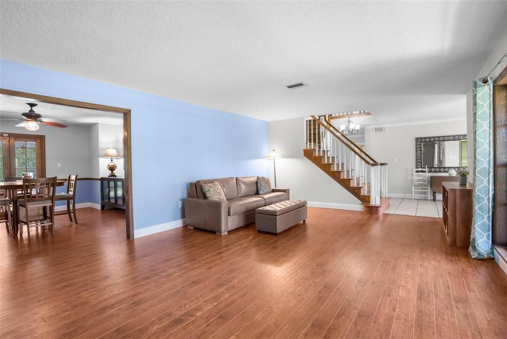 Living room with wood burning fireplace