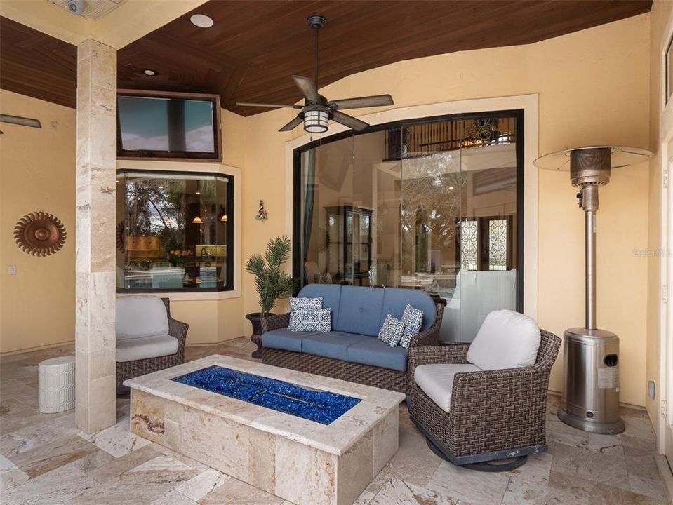COVERED LANAI WITH FIRE-PIT OUTSIDE OF FAMILY ROOM
