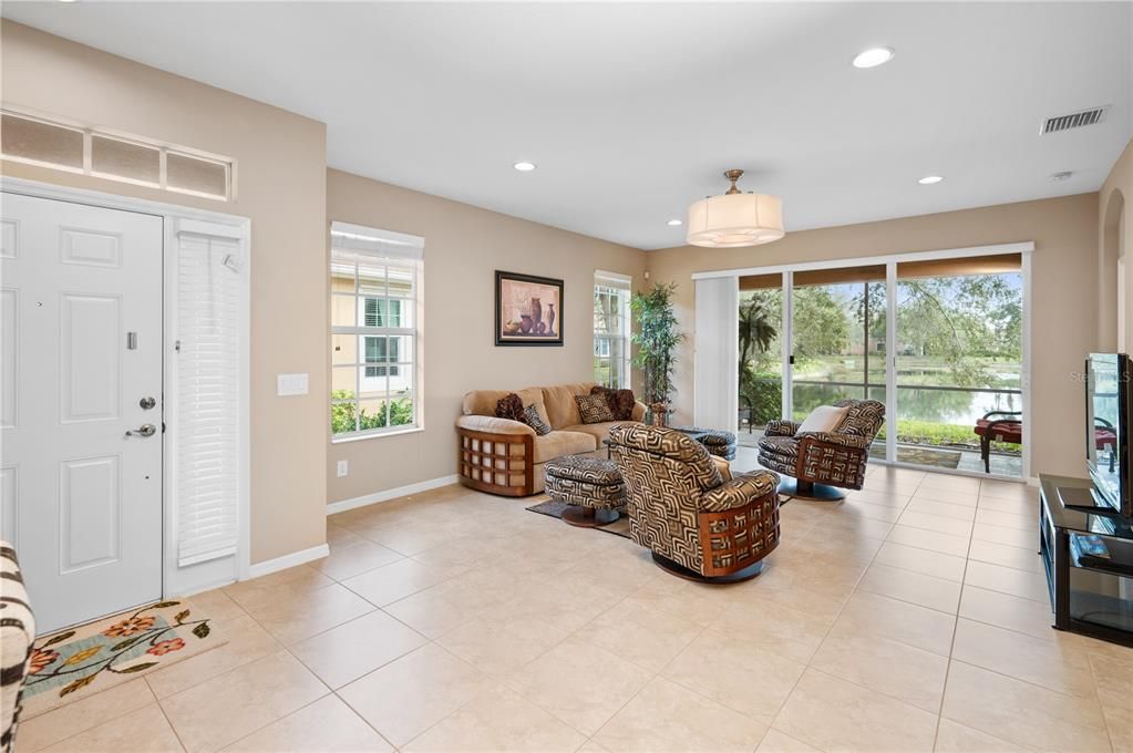 Open floor plan- kitchen is on the other side of the living room and both enjoy the serene view