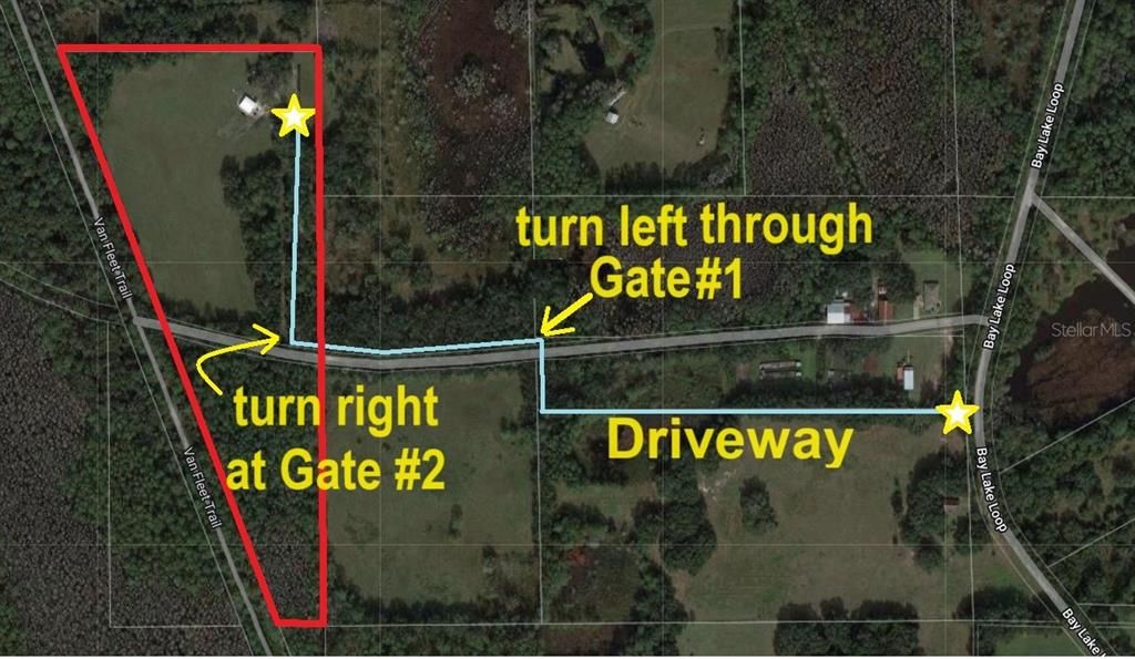 Driveway (light blue line) is private and 1/4mi long. Look for the real estate sign on Bay Lake Loop. Go through first gate must be closed at all times turn right at second gate.