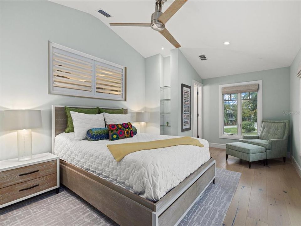 Guest bedroom with high ceilings