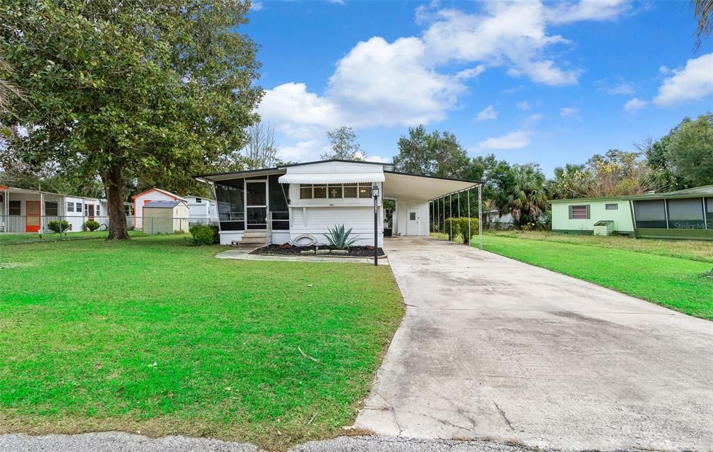 3 Bedroom/2 Bathroom MH w/ Large Screened in Patio & Carport