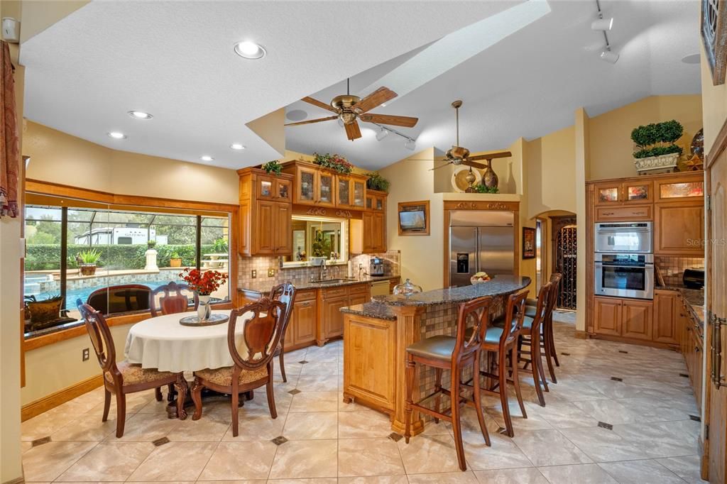 Breakfast Nook and Kitchen with Fabulous Pool View