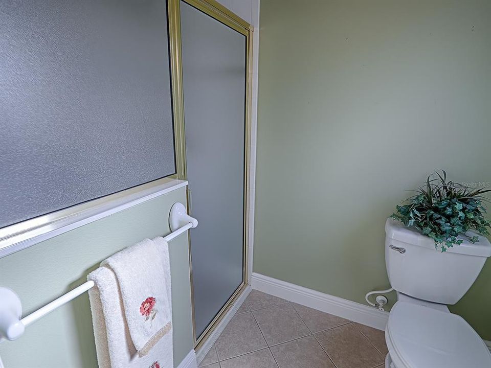 Primary bath shower and commode