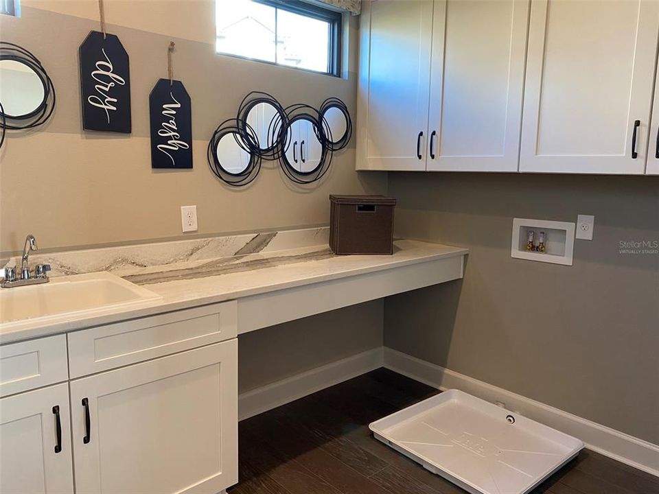 Laundry room now includes washer/dryer