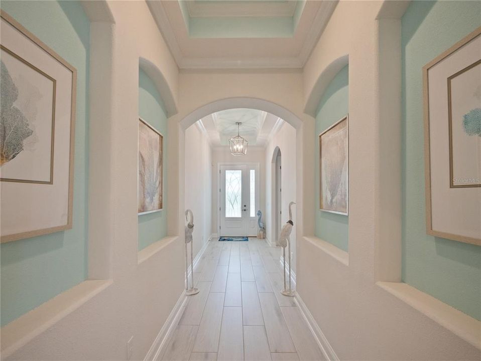 Elegant Foyer with High, Tray Ceilings, this view faces front door.