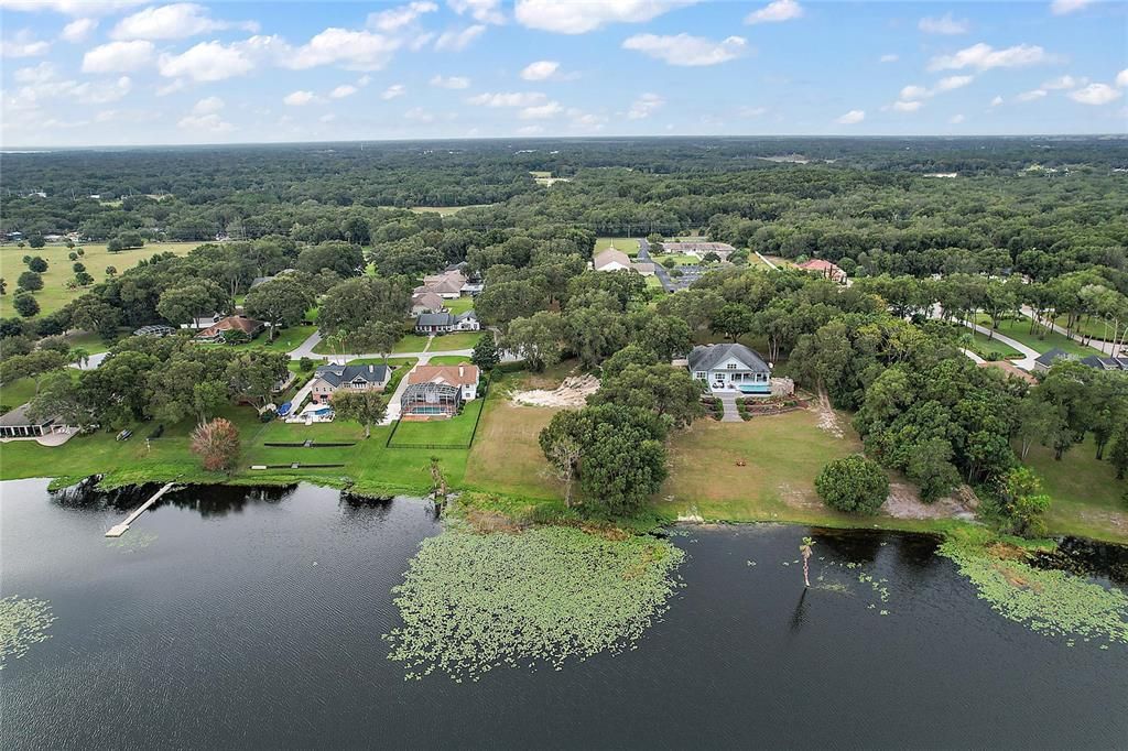Aerial of Lake Area behind Property
