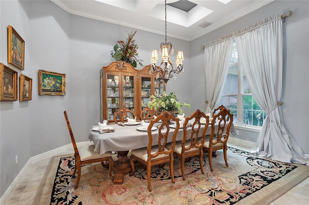 Formal Dining Room with 12ft and coffered ceilings