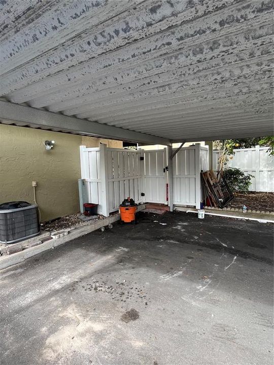 Carport and Gate to Fenced Patio