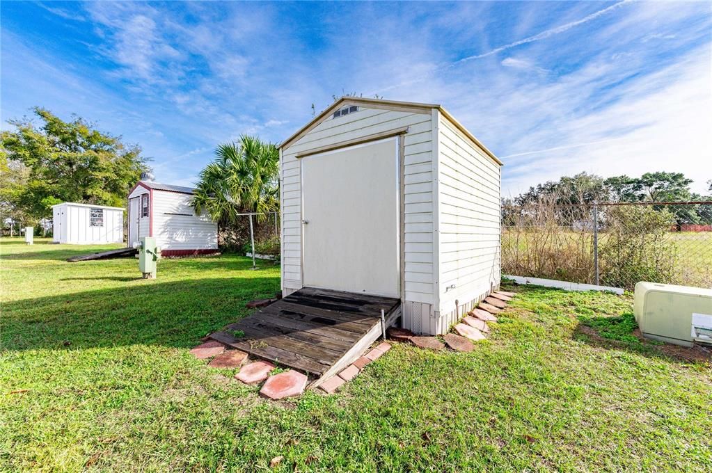 Two storage sheds located in backyard..