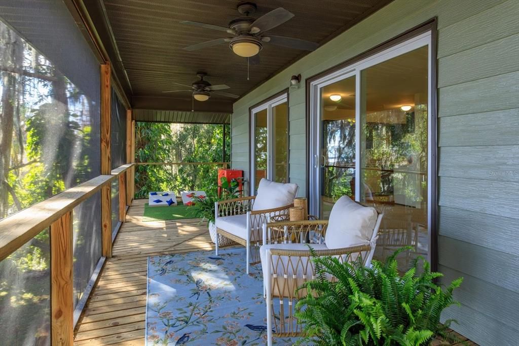 The elevated screened porch is the perfect place to enjoy the mornings, the lake and a cup of coffee.