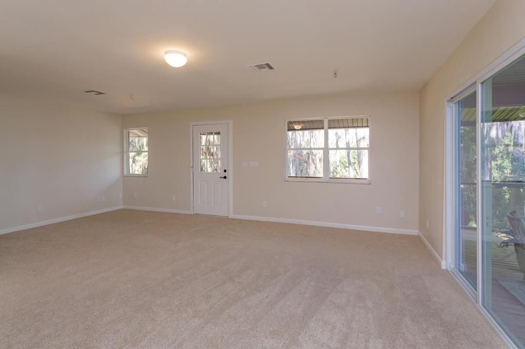 Spacious Family Room with new sliding doors.