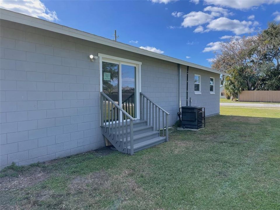 Rear yard with sliding doors from the living room