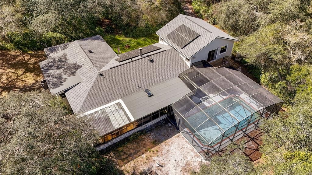 Aerial view of home from the back  on 5 acres