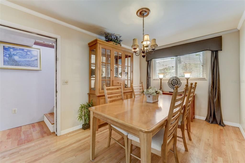 Dining room with door that leads to in law suite/apartment