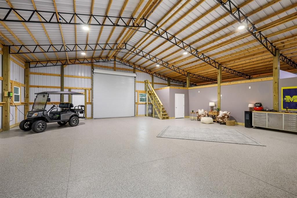 Spacious garage with ample space for boats, RV's, additional vehicles, storage and more!