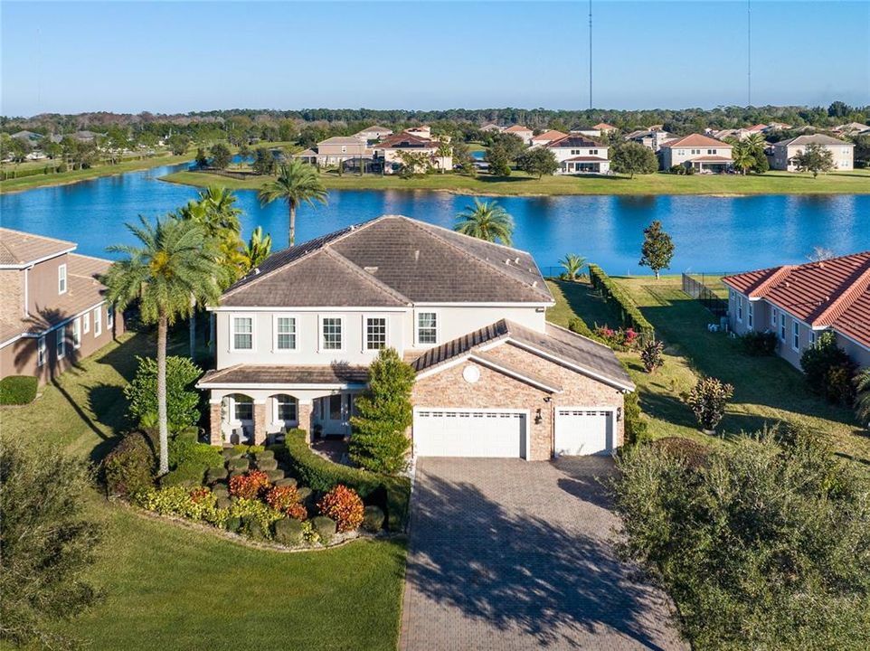 Welcome to 3131 Fontana Estates! Situated on over 1/2 ACRE private lot with tranquil water views.