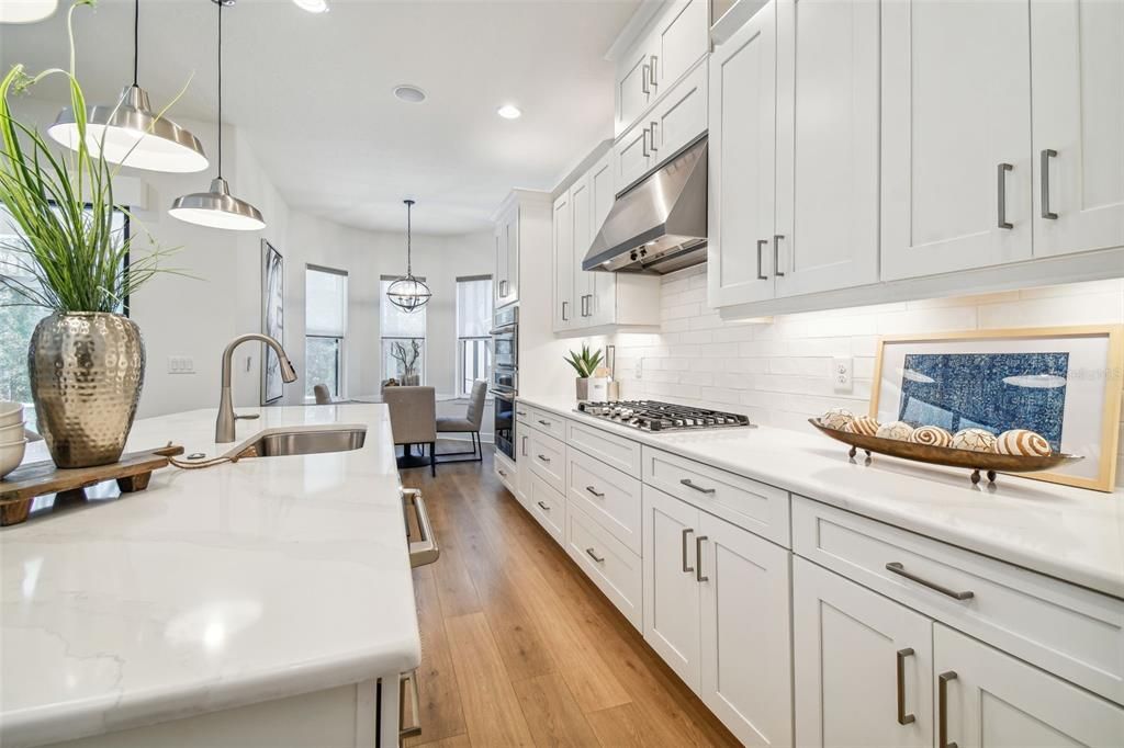 Those that enjoy cooking will love the gas cooktop and the amount of counterspace that this kitchen offers.