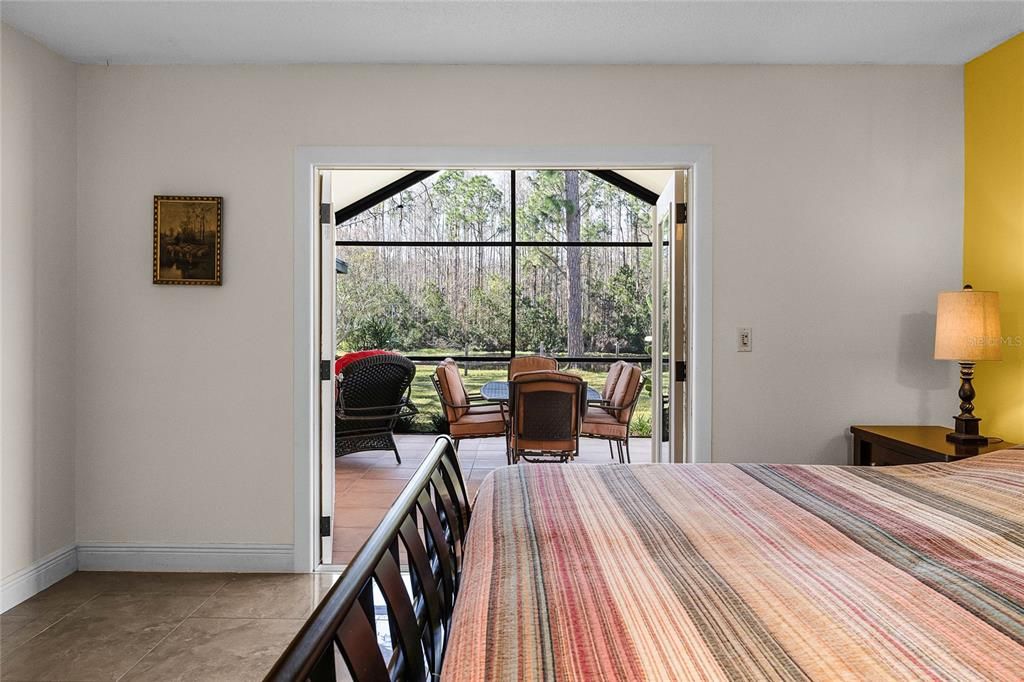 Enjoy cool Florida evenings with the option to open your master bedroom french doors at night to sleep.