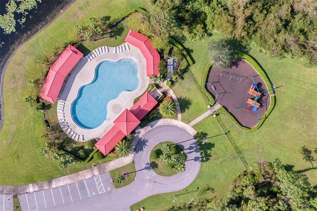Birdseye view of the community pool and playground.