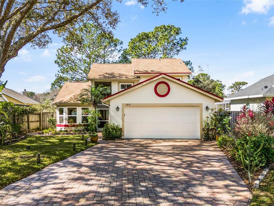 Immerse yourself in tranquility and convenience at this amazing green home located on a quiet tree lined cul-de-sac in the vibrant Cypress Springs community of East Orlando
