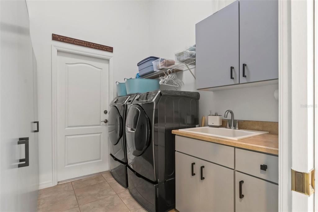 Washer & dryer included.  Lots of storage in laundry room