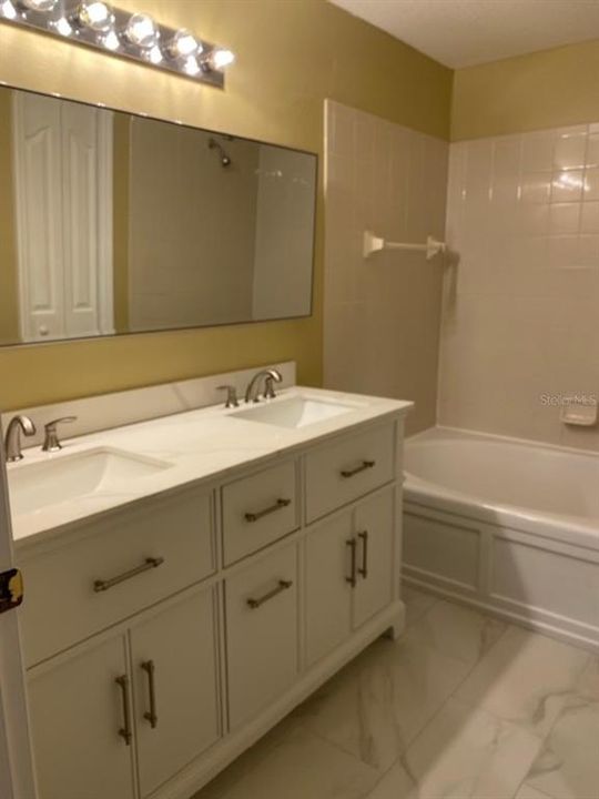 Master Bath-new double vanity and tile floor